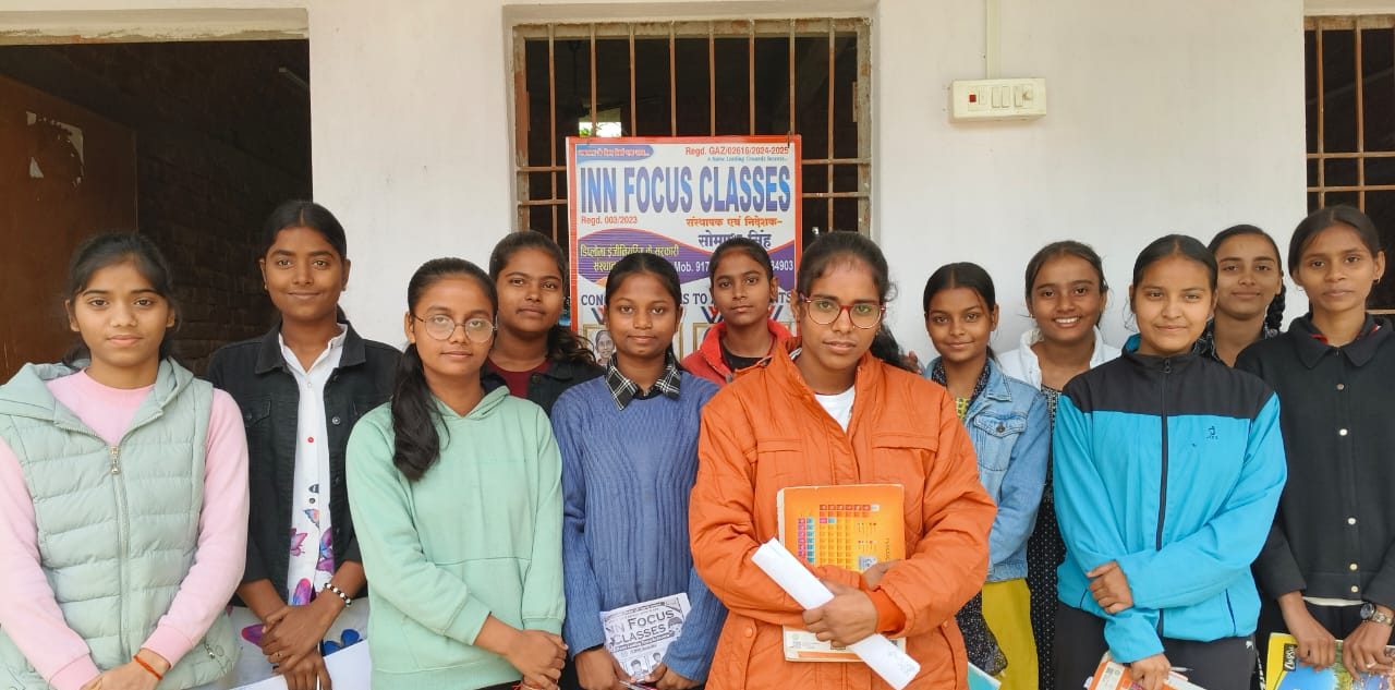 Girl students of INN Focus Classes with study materials