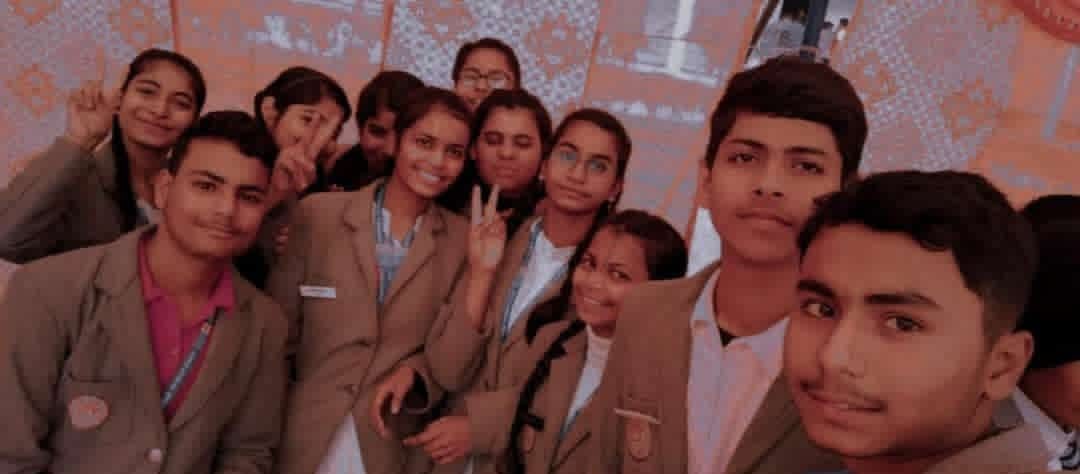 Students smiling together at INN Focus event